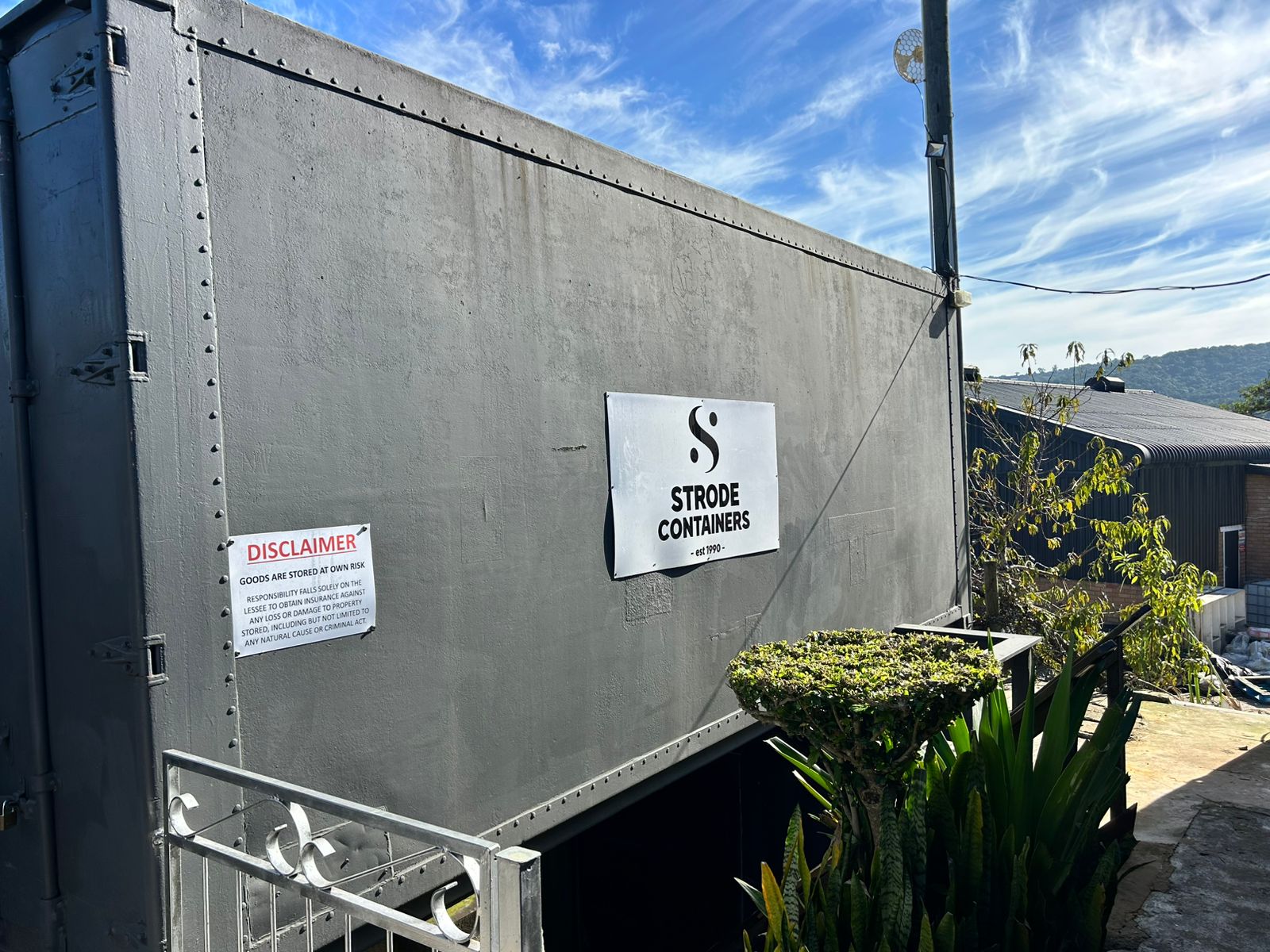 Strode Containers yard signage in Knysna — established 1990
